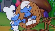 Gargamel se snaží oklamat vědmu, aby si pochutnal na šmoulech